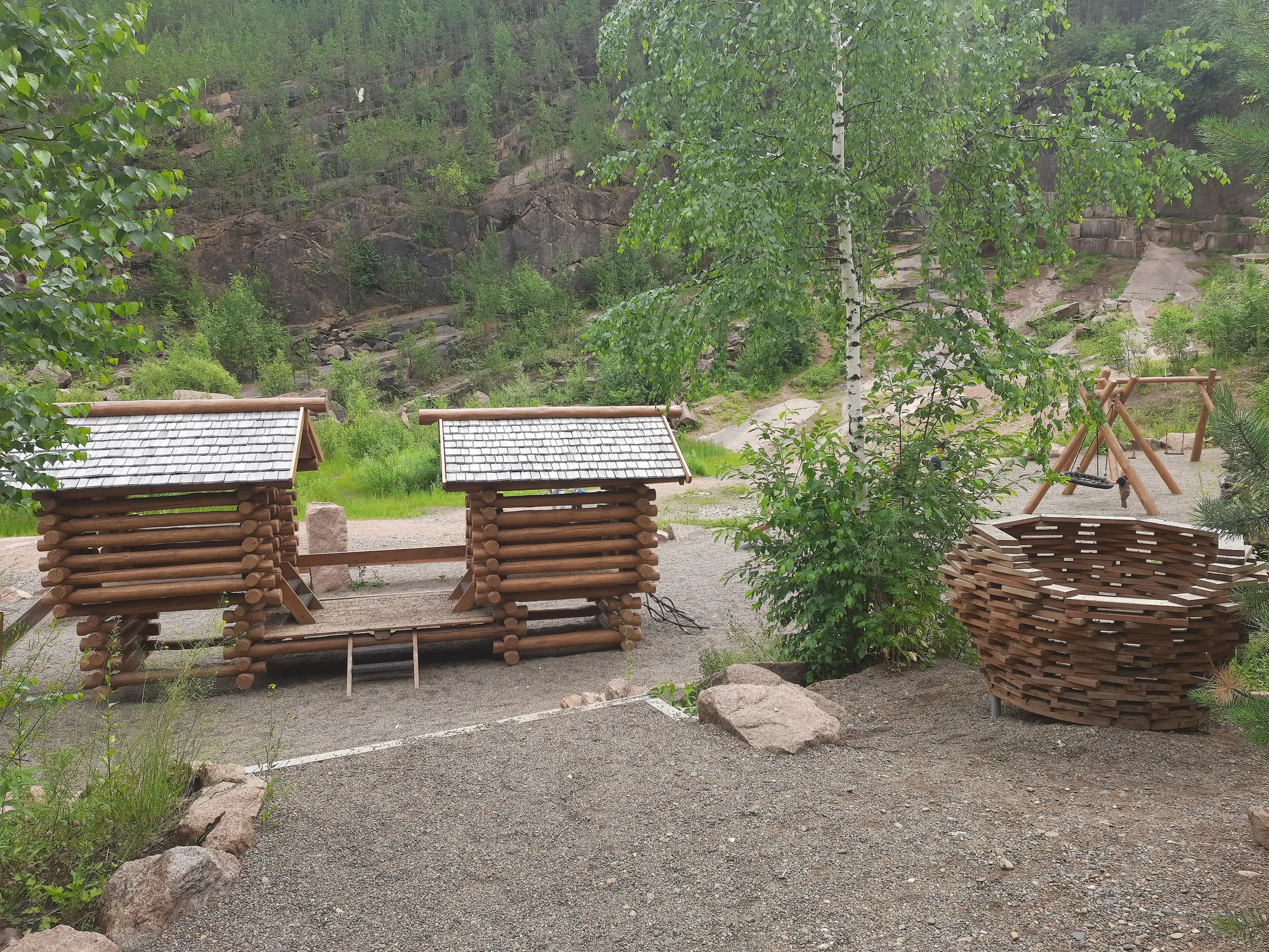 Granite quarry with cut stone benches and extracted blocks