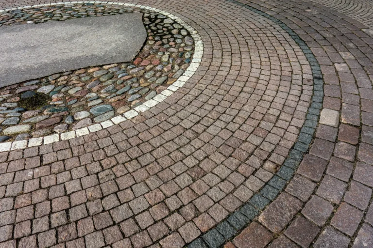 Granite sett paving laid in circular patterns
