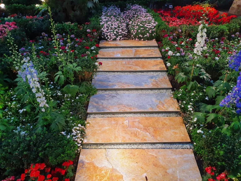 Natural stone garden path through a landscaped garden