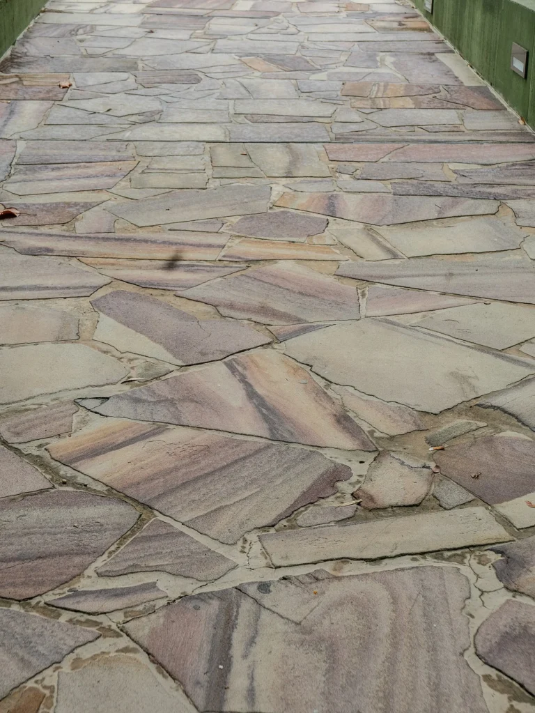 Natural sandstone paving laid as a public pathway